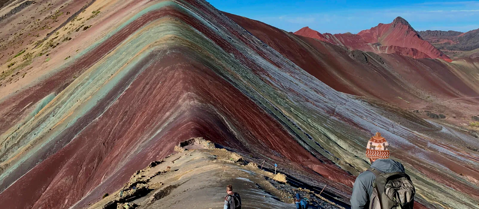 traveling happy Rainbow Mountain